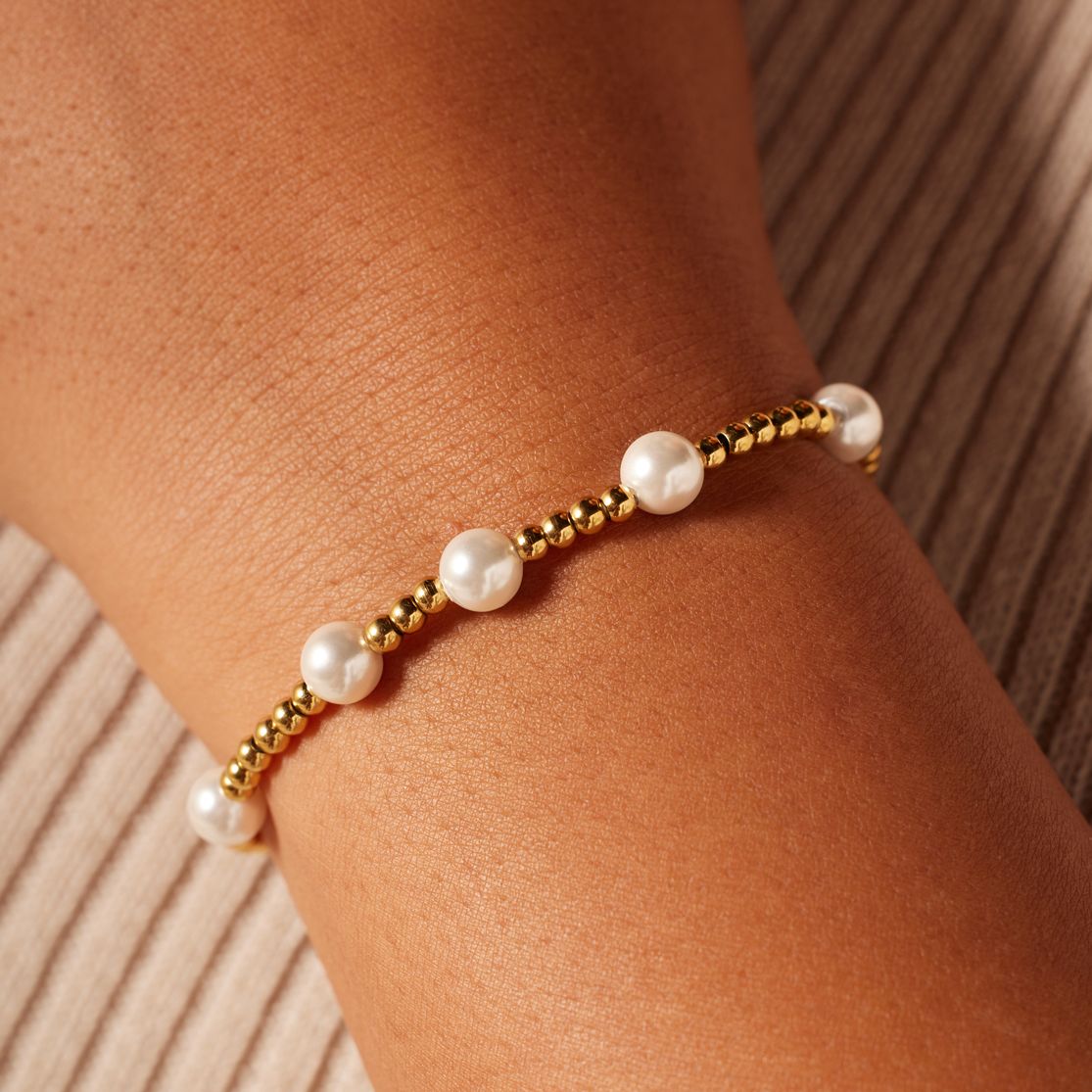 Stainless steel goldplated kralenarmband met parel voor dames