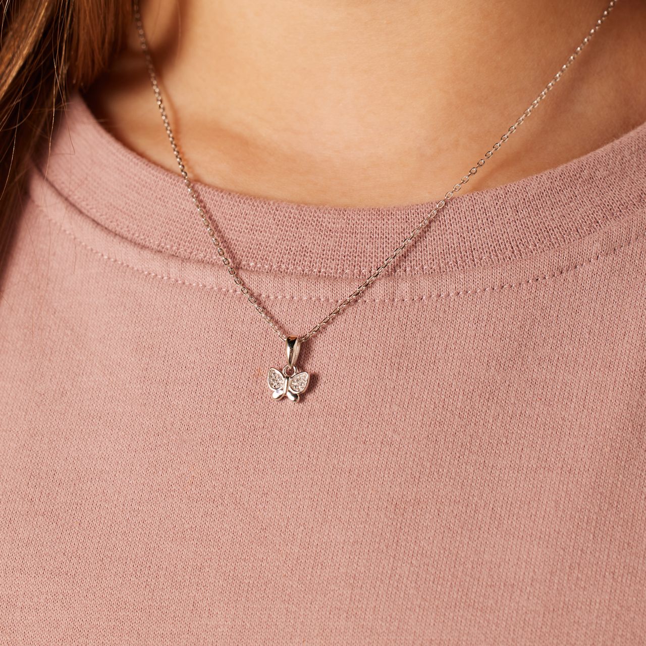 Zilveren ketting met vlinder
