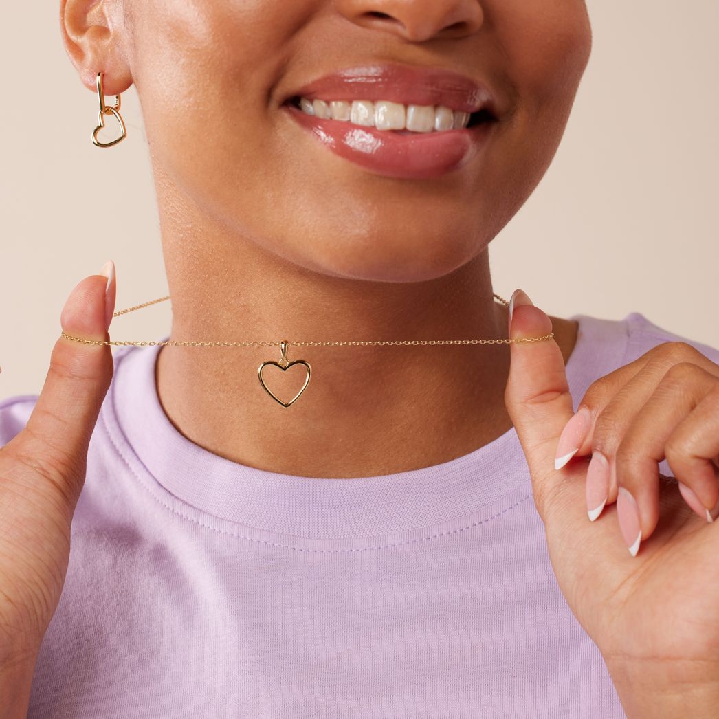 Zilveren goldplated ketting met hanger en oorbellen
