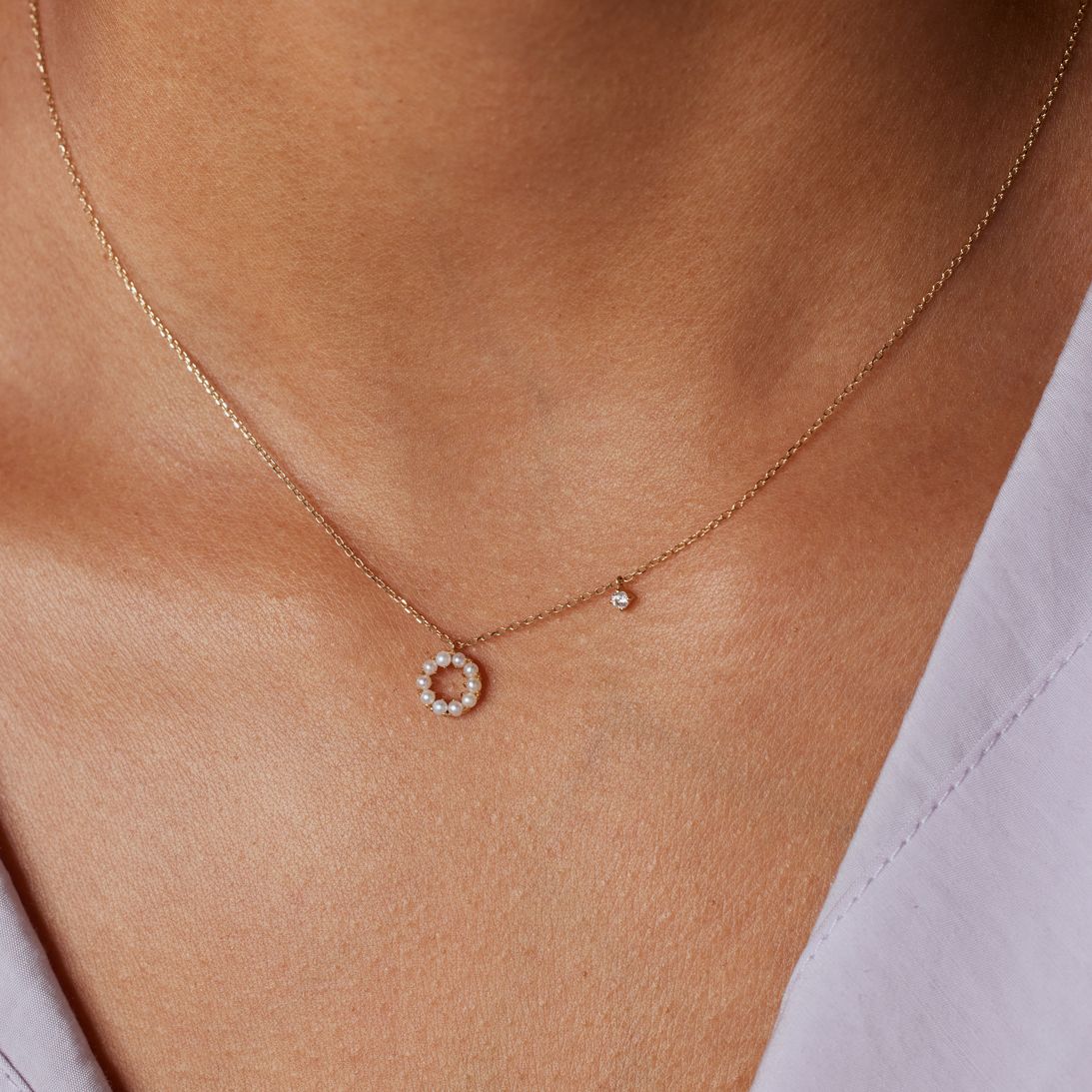 14 karaat gouden ketting met zirkonia en zoetwaterparel