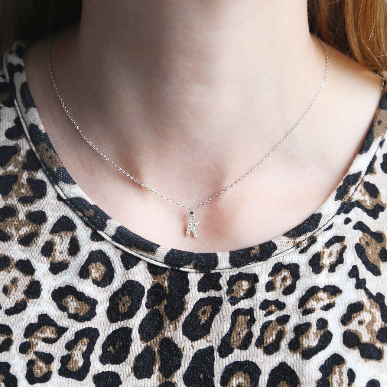 Zilveren kinderketting initialen met wit kristal