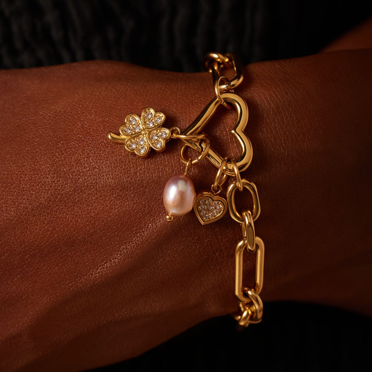 Stainless steel goldplated schakelarmband voor dames