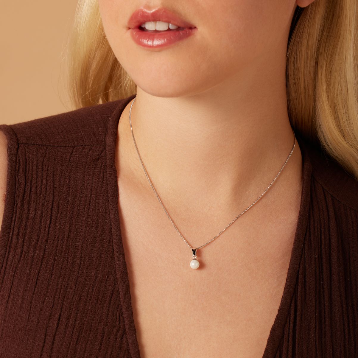 Zilveren ketting met hanger parel