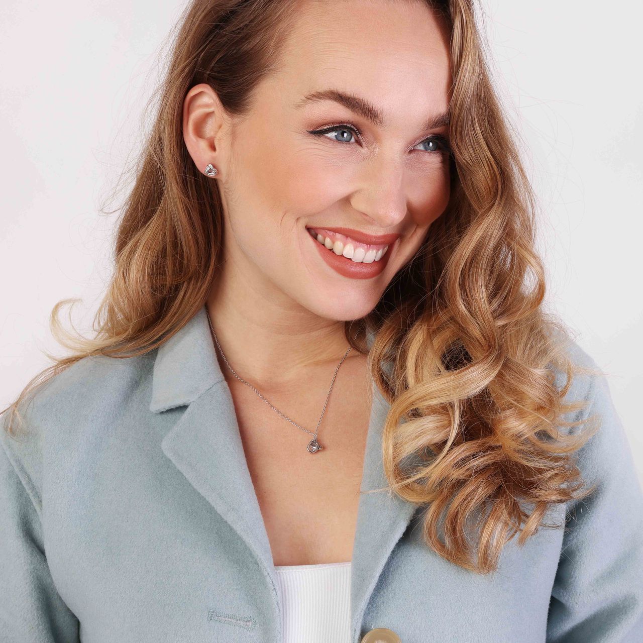 Zilveren set ketting&oorbellen knoop zirkonia