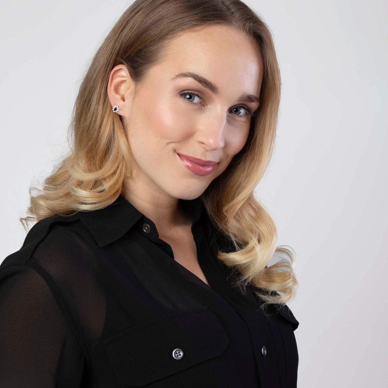 9 Karaat oorknoppen met wit/blauwe zirkonia