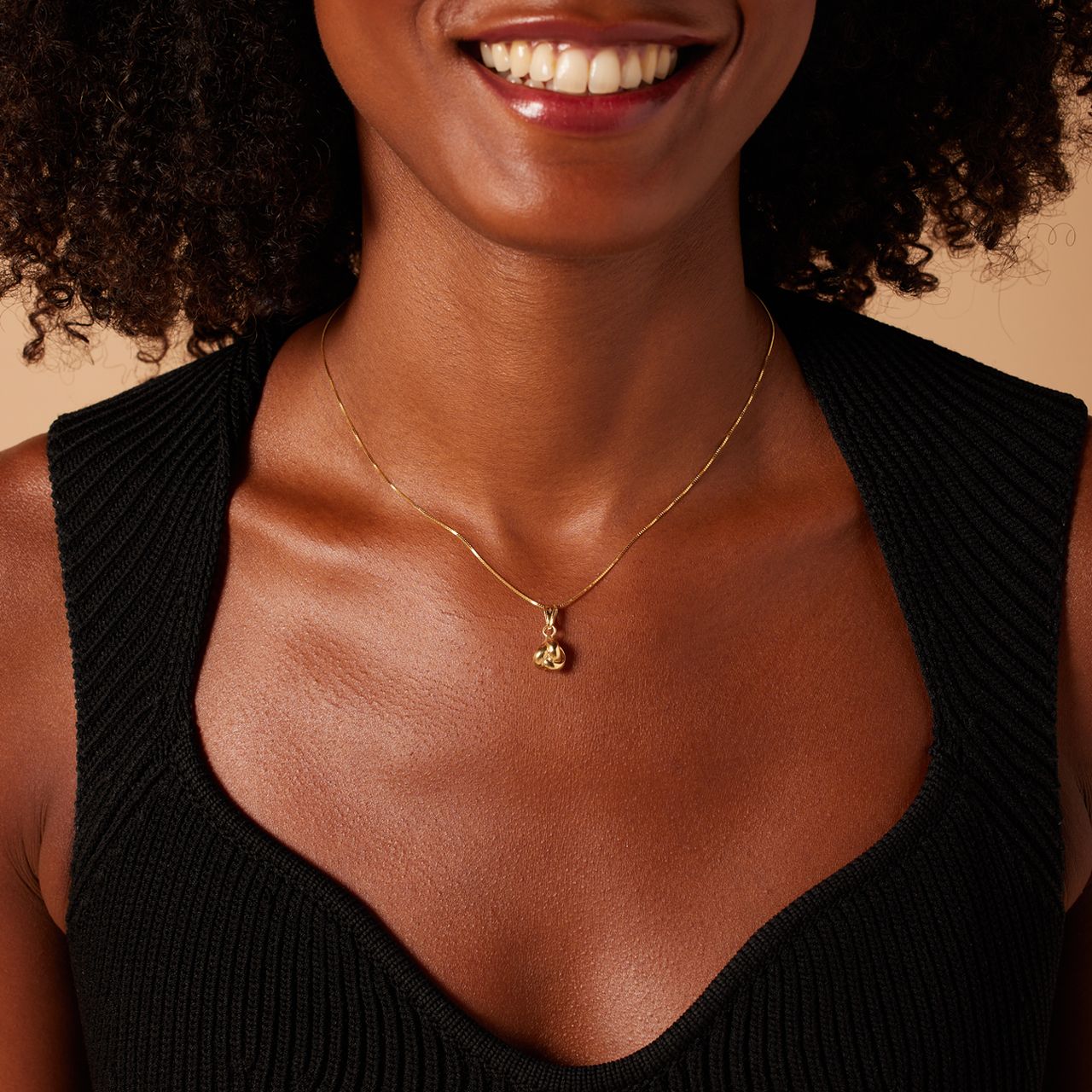 9-karätige Goldkette mit Charms Knoten