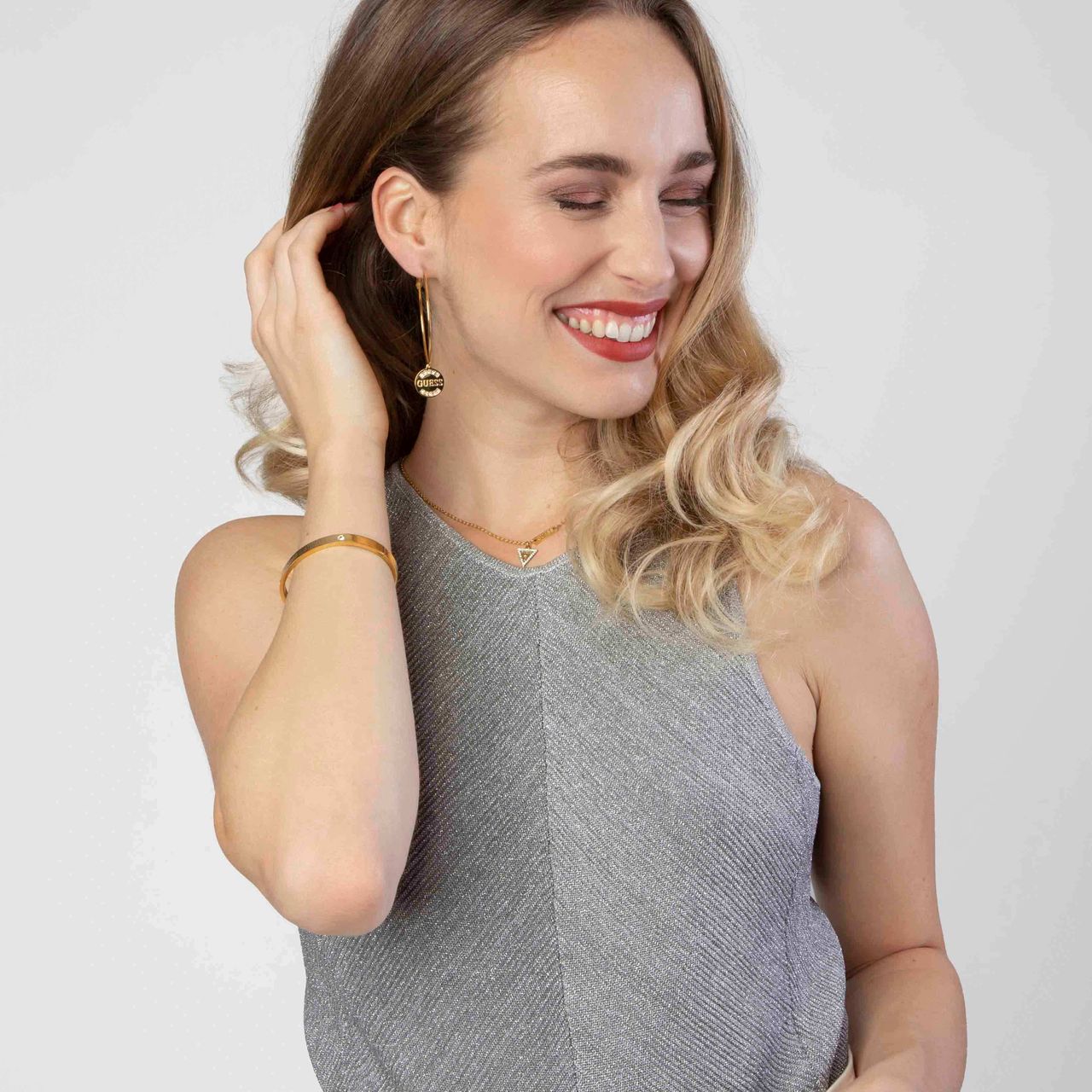 Guess stainless steel goldplated bangle met kristal voor dames