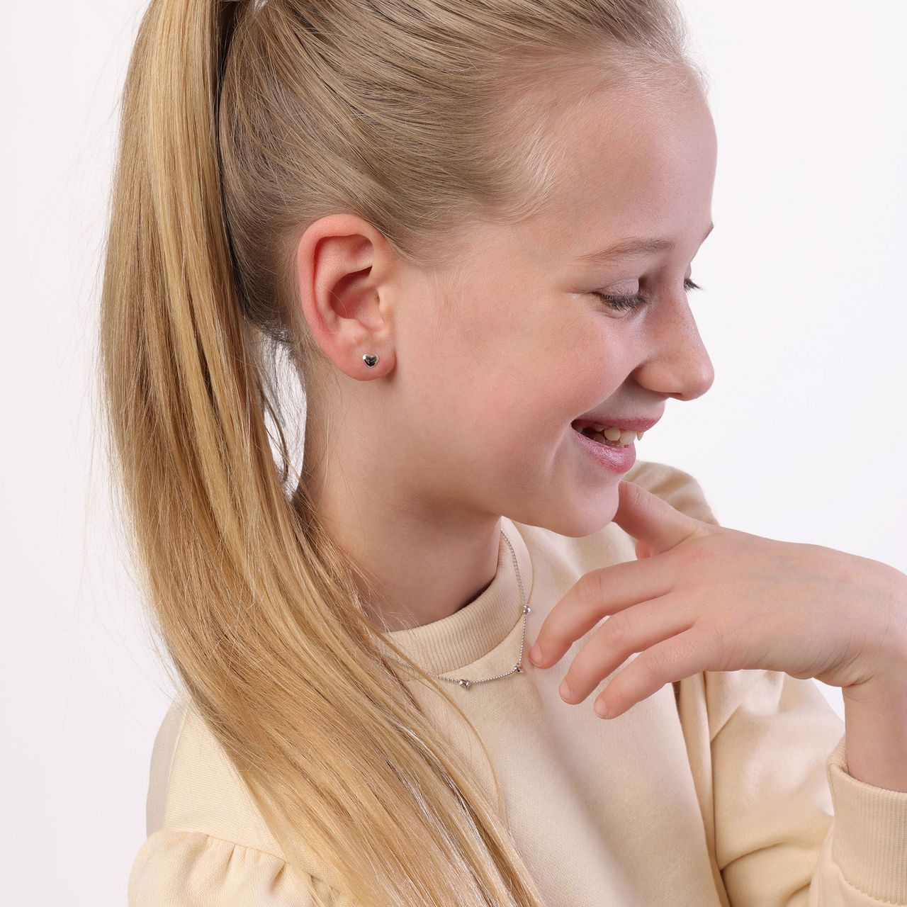 Zilveren kinderoorbellen hart