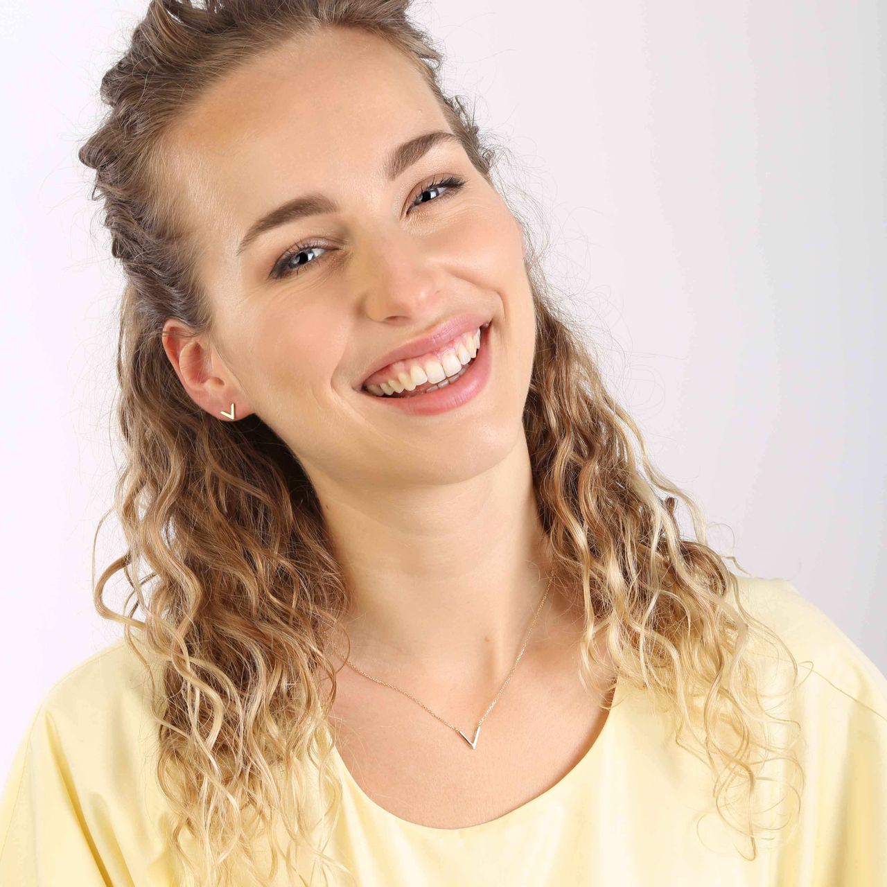 Silbernes Set mit vergoldetem V