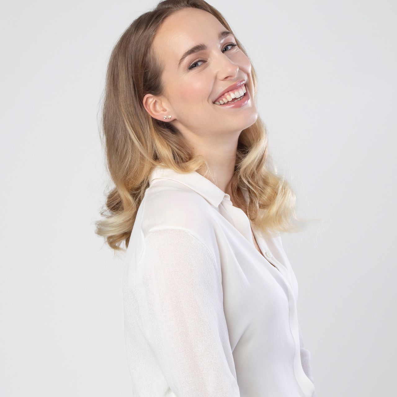 14 karaat geelgouden oorknoppen met zirkonia voor heren