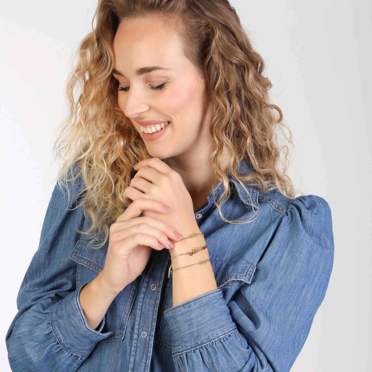 Stalen naamarmband goldplated minimalistisch cursief