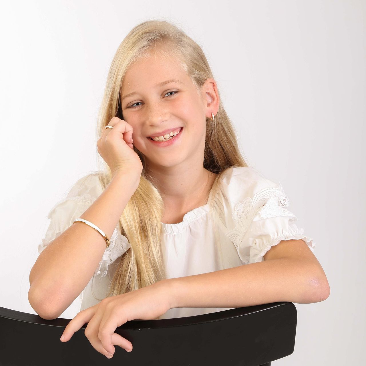 Stalen goldplated kinderoorringen met wit kristal