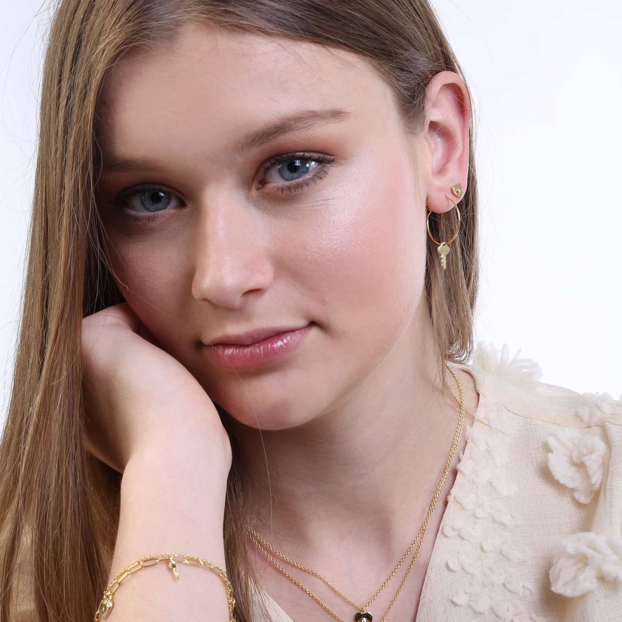 Zilveren goldplated oorknop hart zirkonia