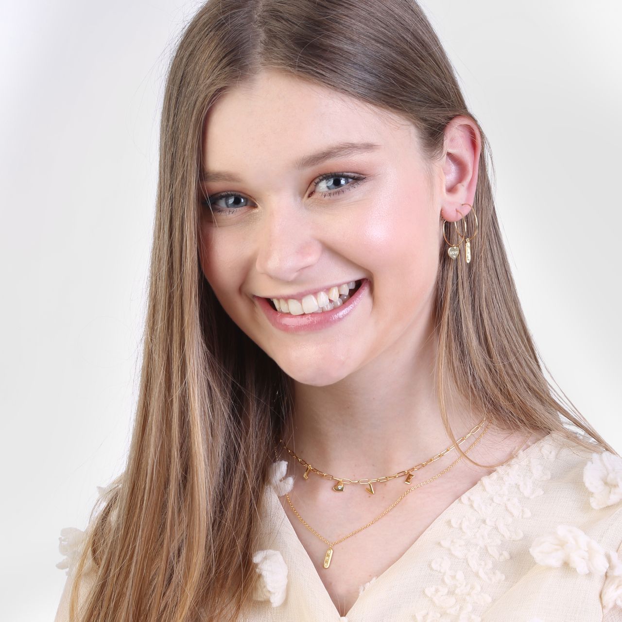 Zilveren goldplated oorringen met hanger bar