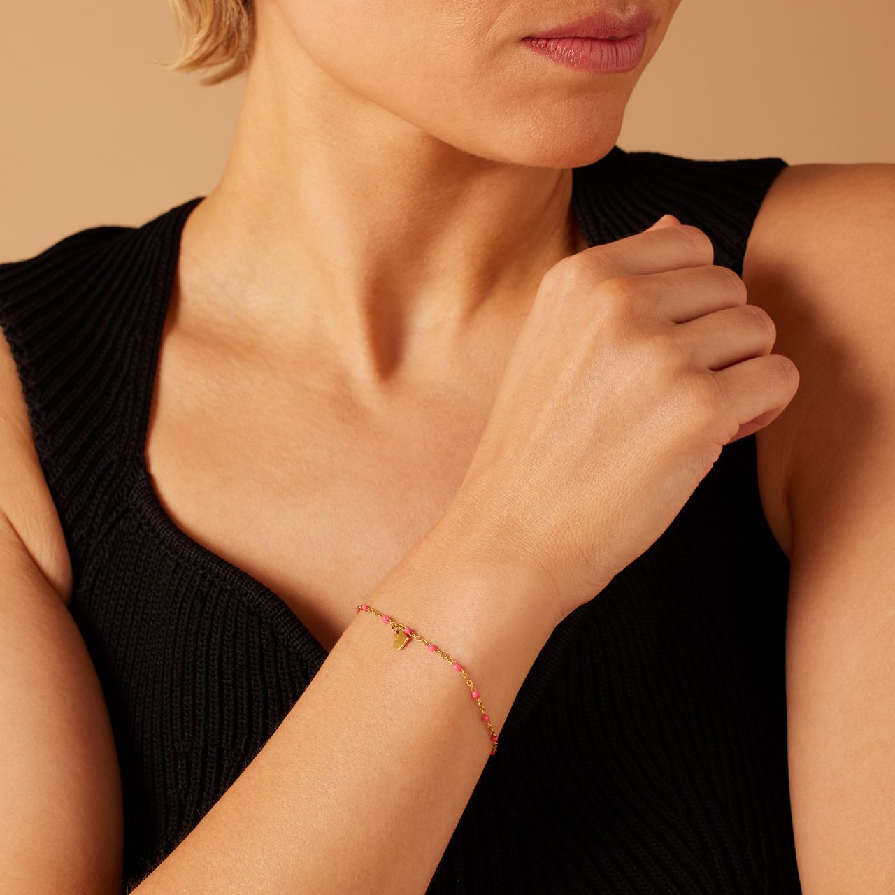 Stainless steel goldplated kralenarmband hart fuchsia emaille voor dames