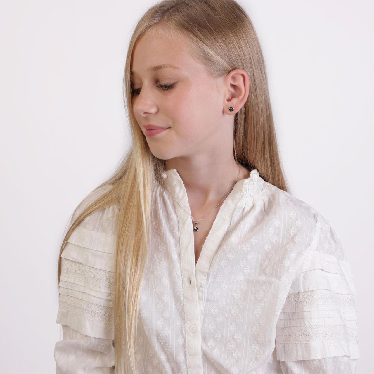 Zilveren kinderketting hanger hondenpoot kristal