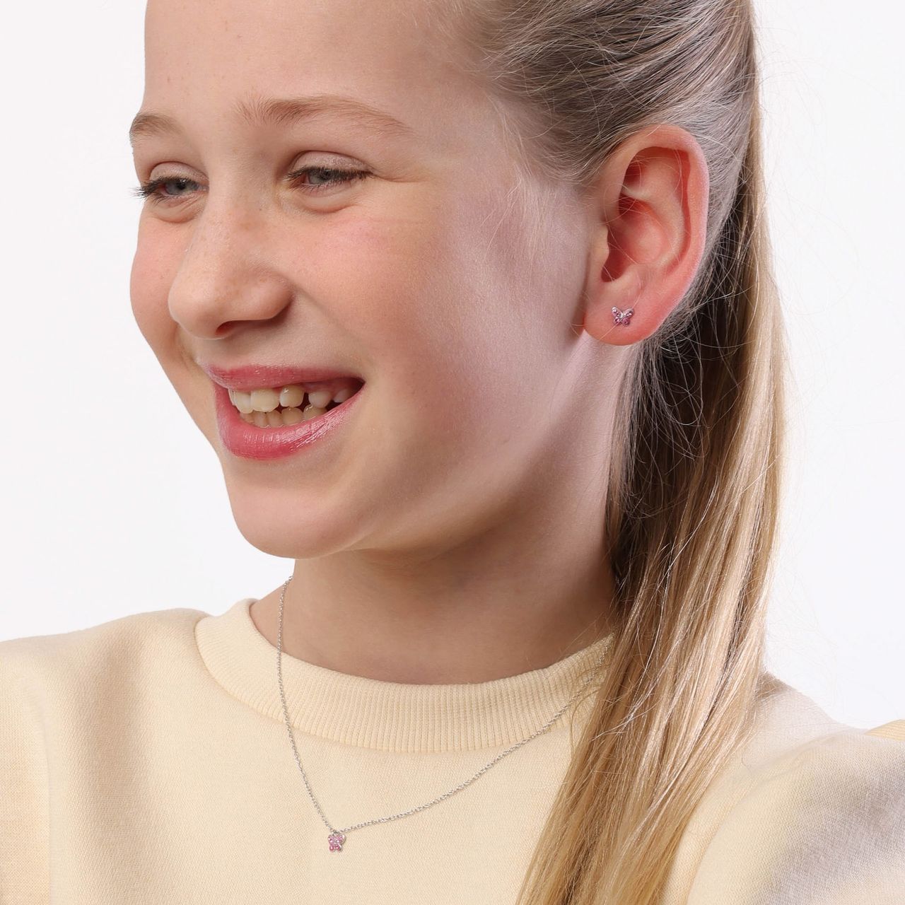 Zilveren kinderketting vlinder roze kristal