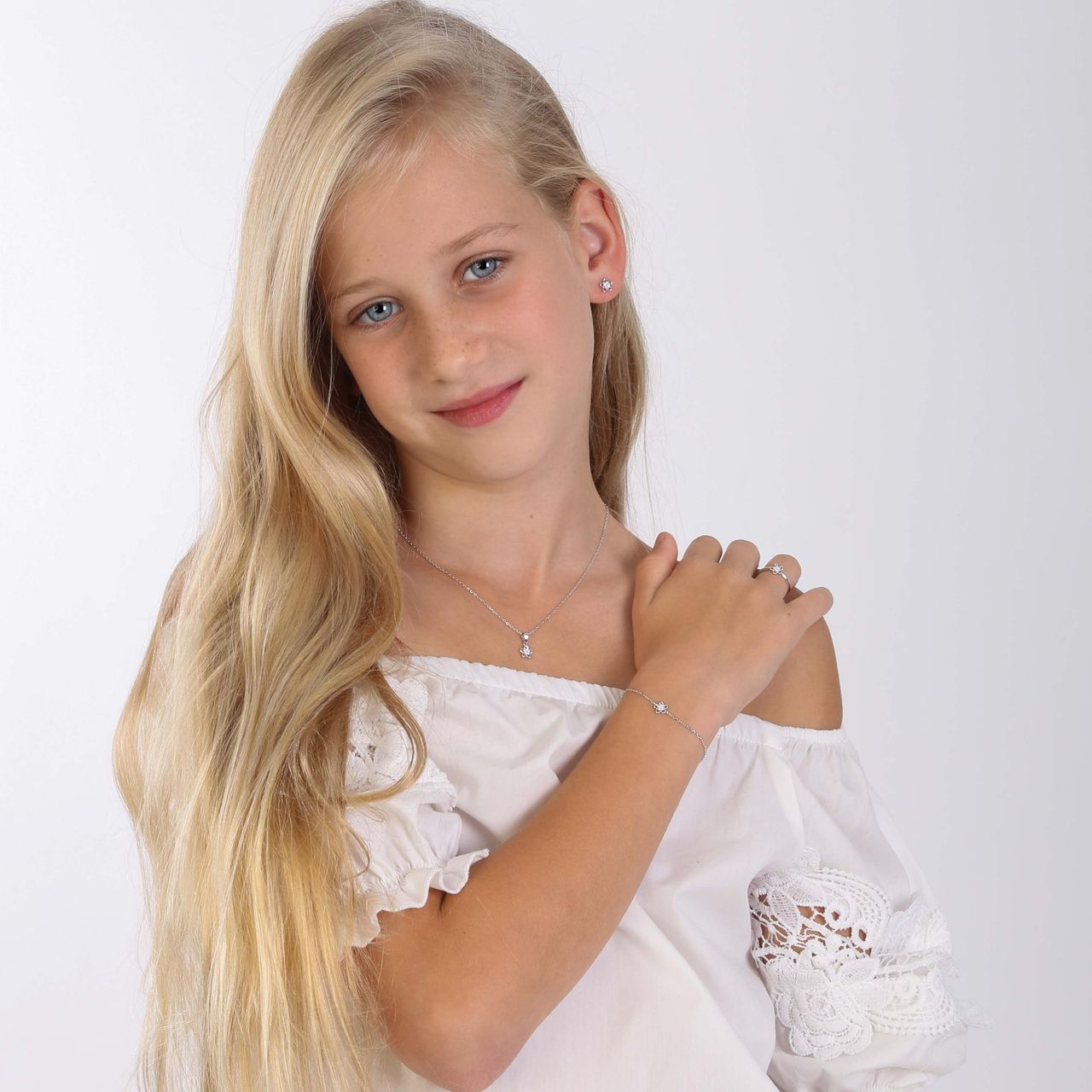 Zilveren kinderketting bloem met roze zirkonia