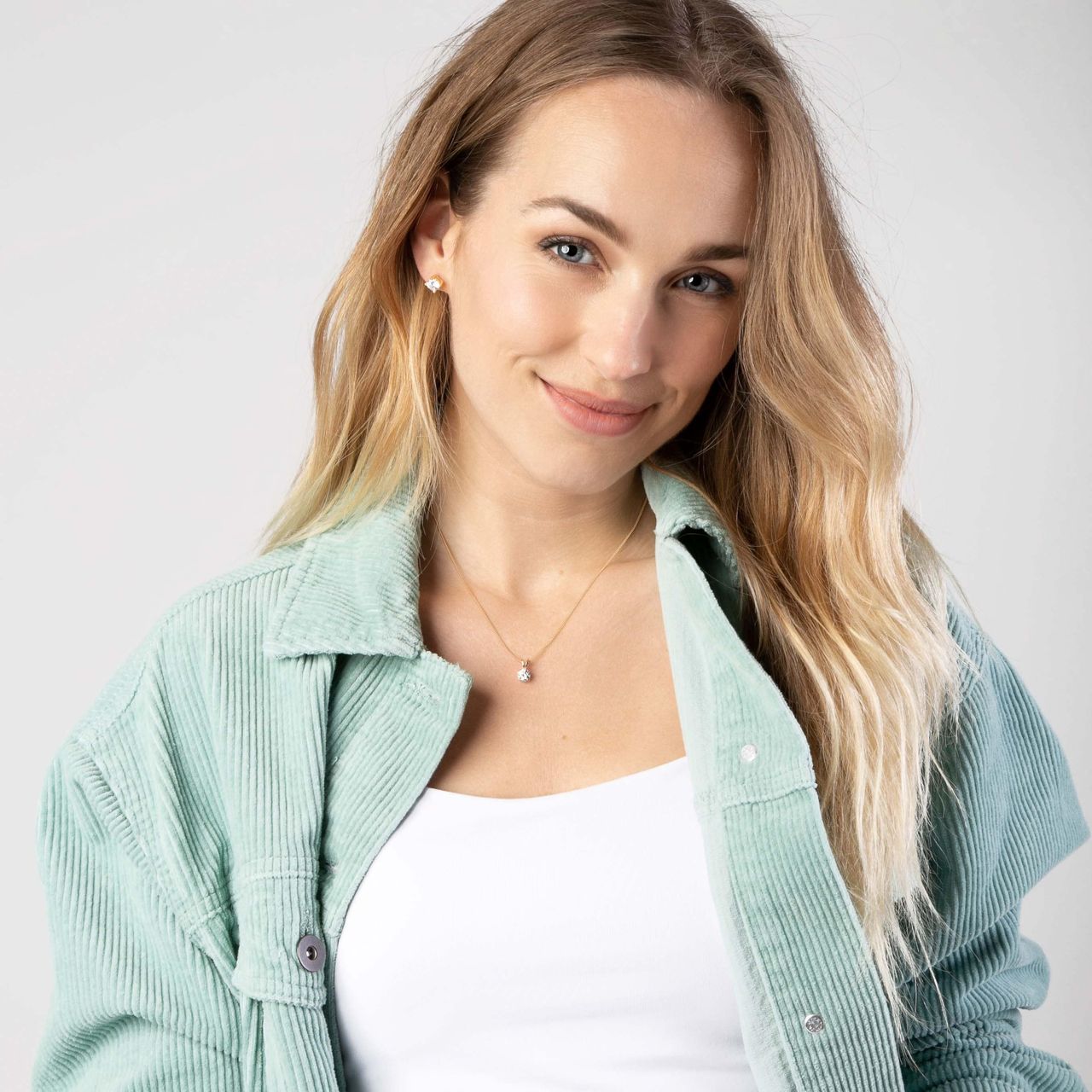 Zilveren oorknoppen goldplated zirkonia 6,5mm voor dames
