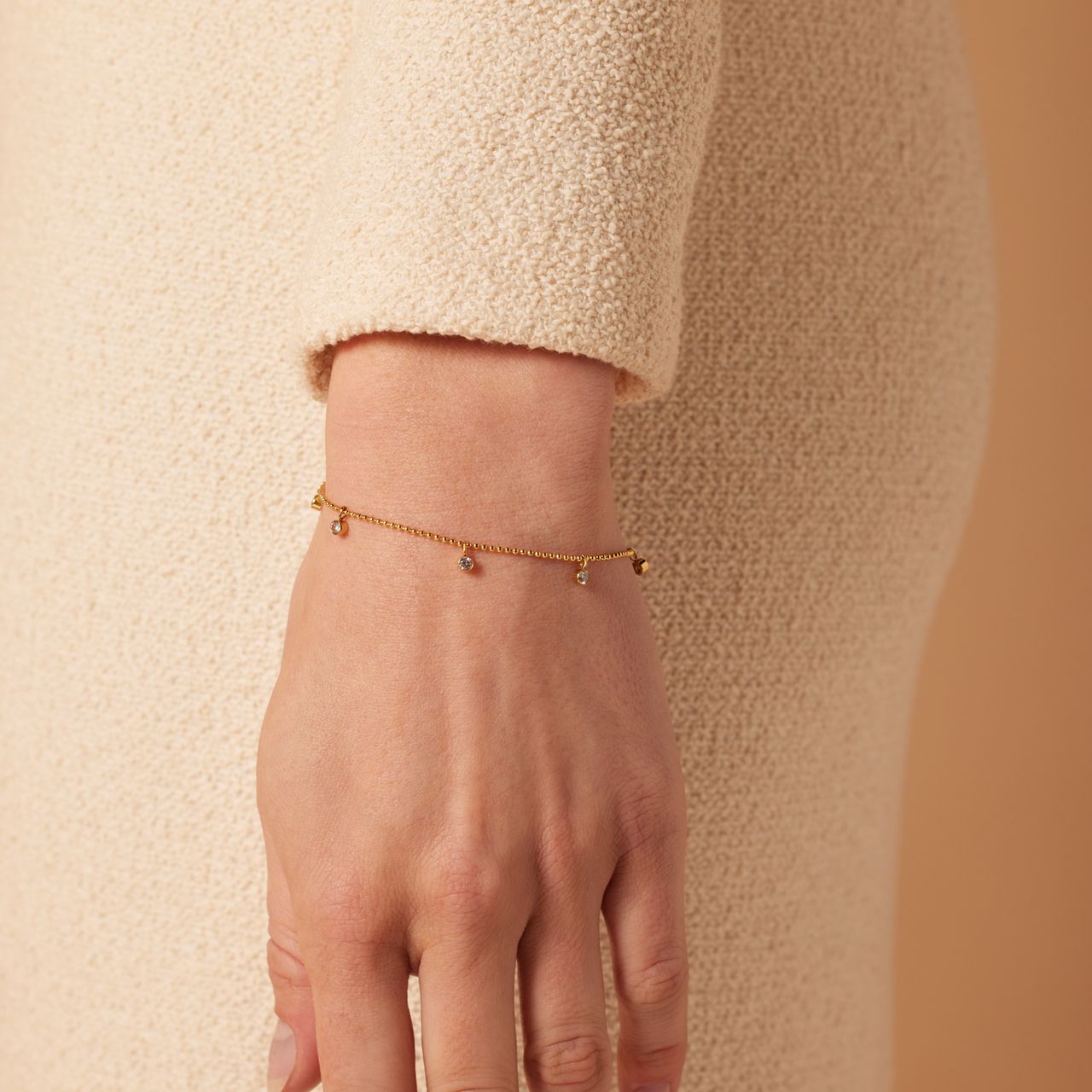 Stainless steel goldplated fantasiearmband  met hanger met zirkonia voor dames