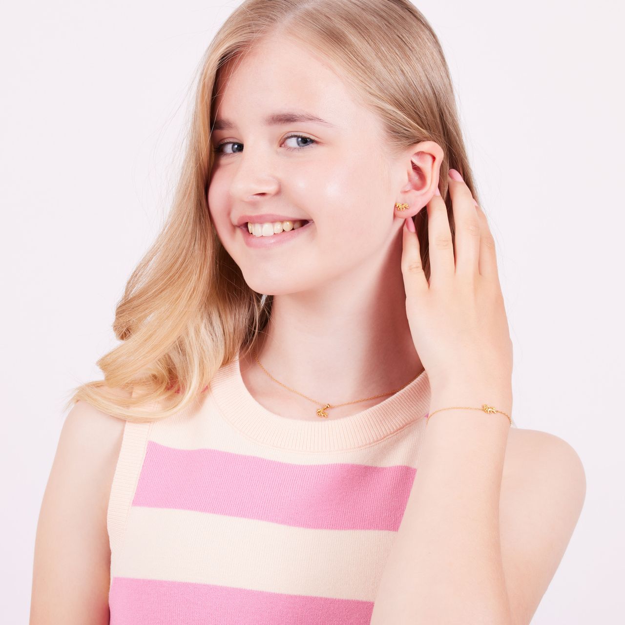 Zilveren goldplated kinderarmband met hanger paard