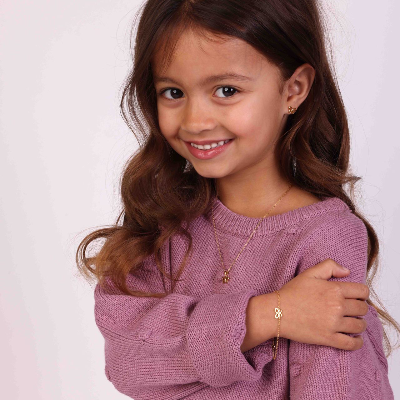 Zilveren goldplated kinderarmband met vlinder