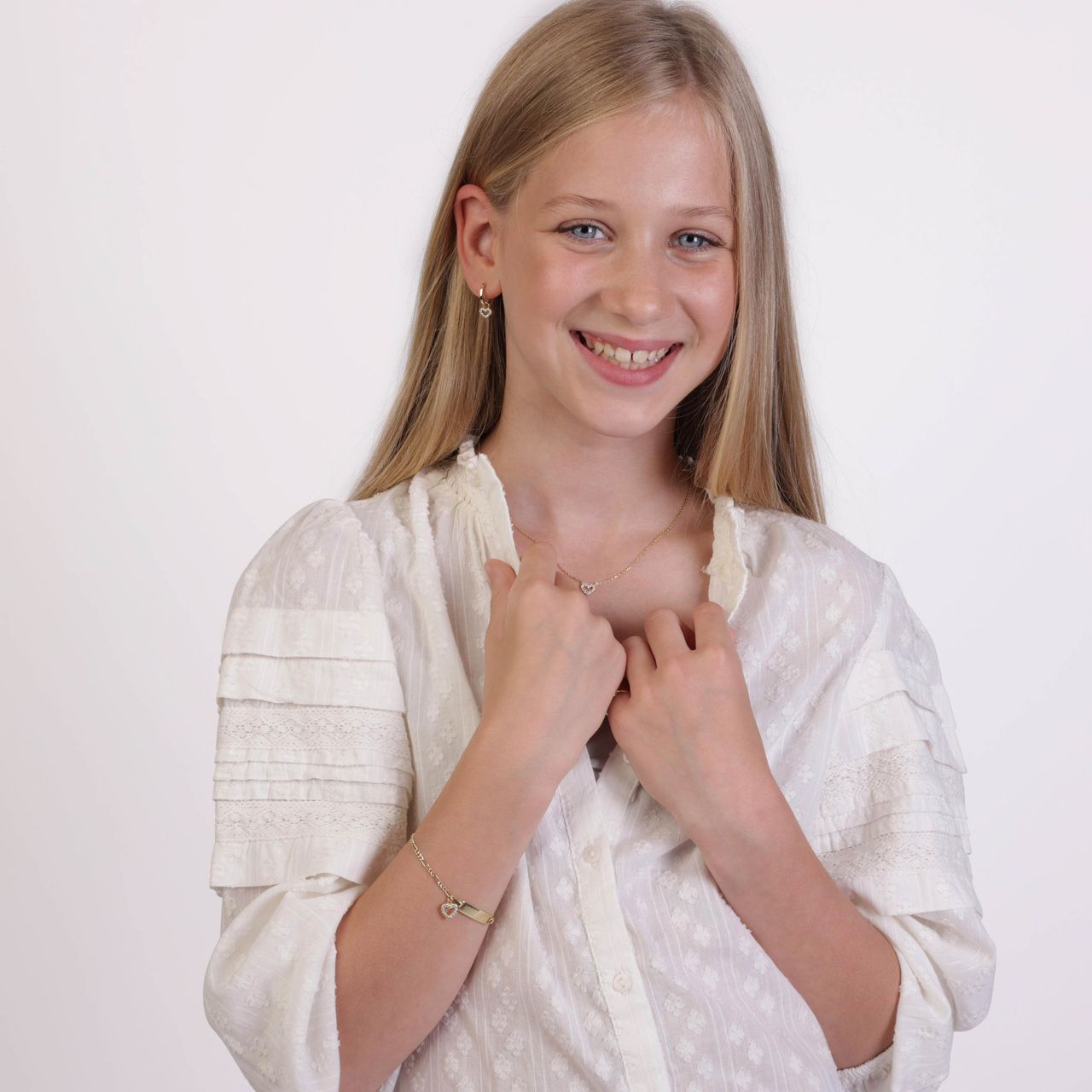 Zilveren gold kinderarmband hart witte zirkonia