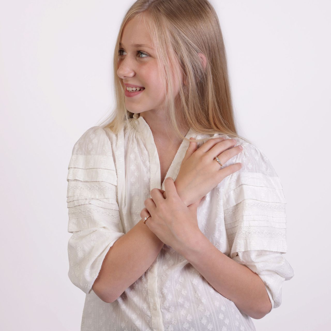 Zilveren goldplated kinderring met witte zirkonia