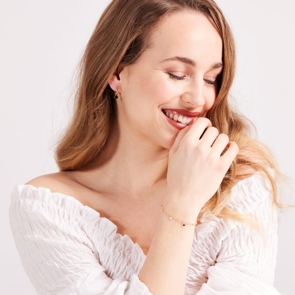 Zilveren goldplated oorringen met hanger bloem voor dames