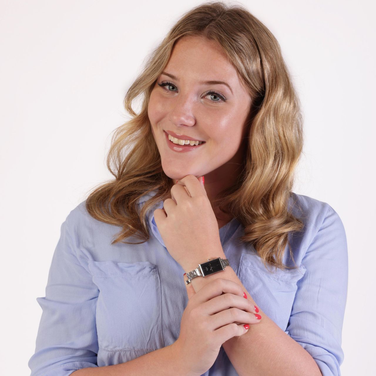 Regal horloge met een stalen kast en band