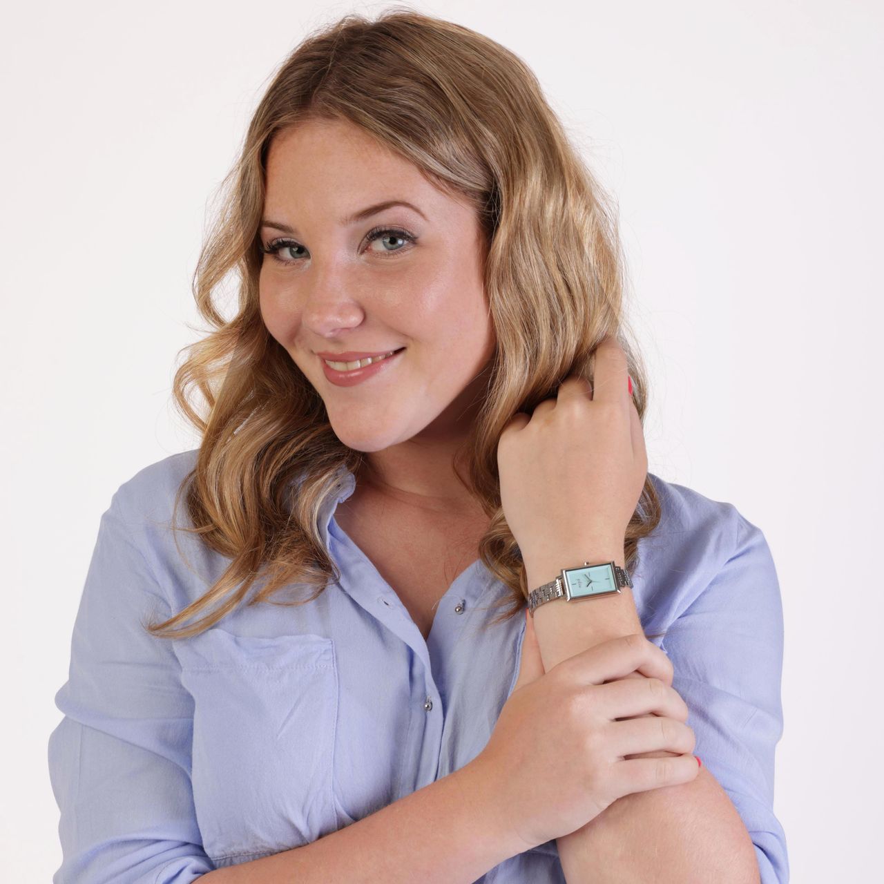 Regal horloge met een stalen kast en band