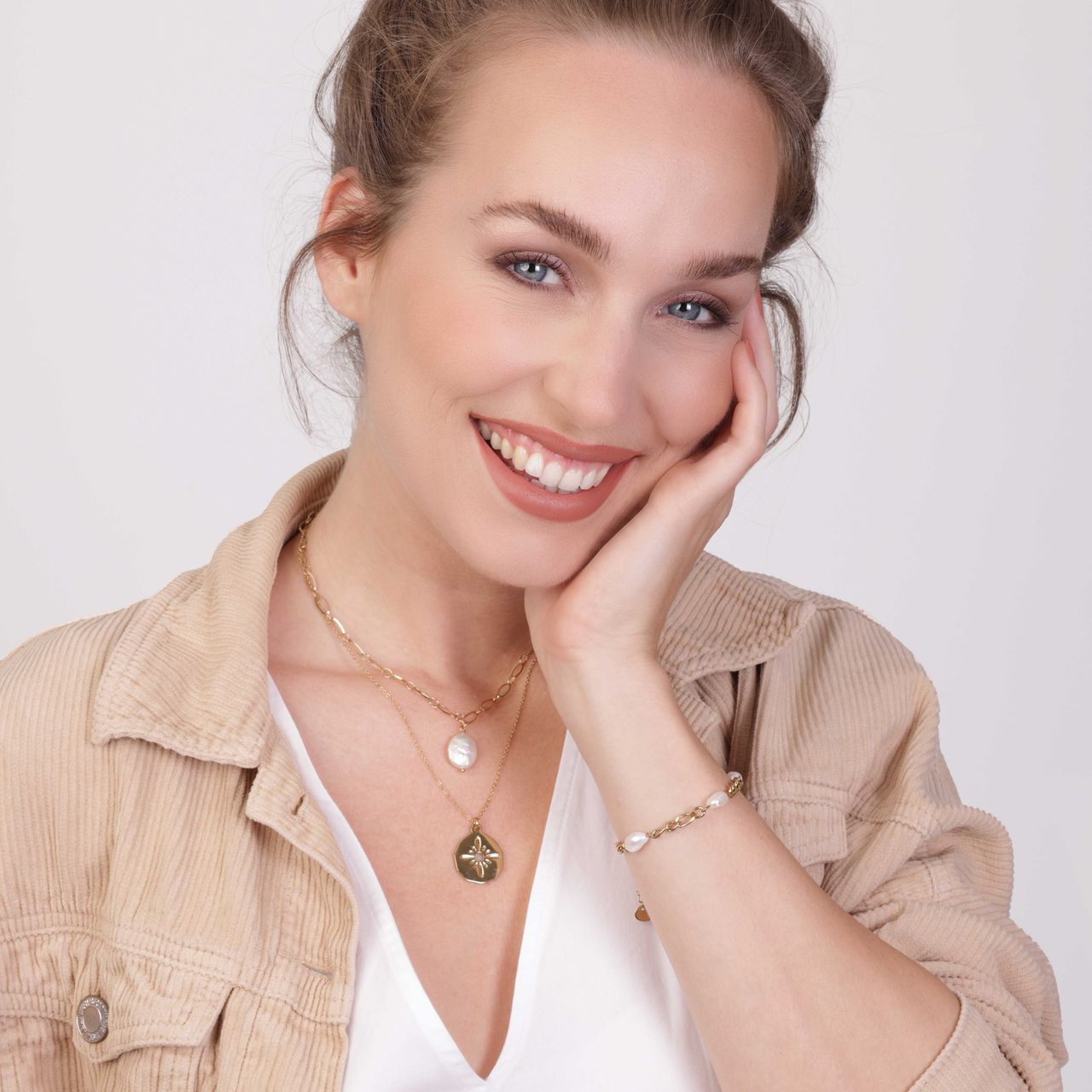Stalen goldplated schakelarmband met parel voor dames