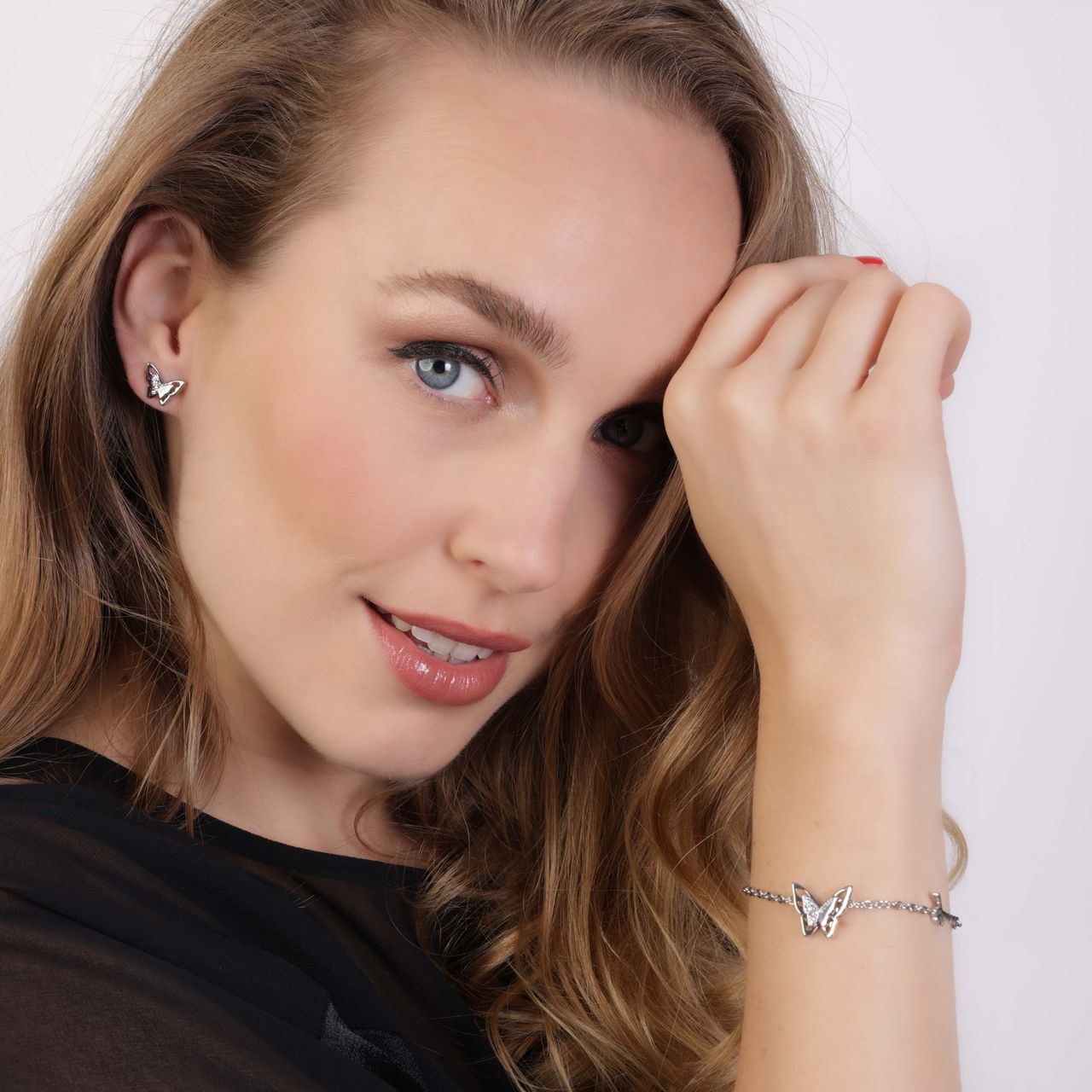 Guess stalen armband met vlinder bedel FLY AWAY