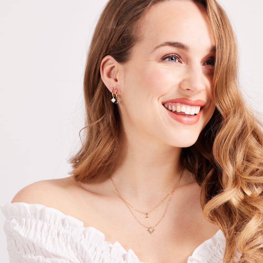 Zilveren set goldplated maan/ster met zirkonia
