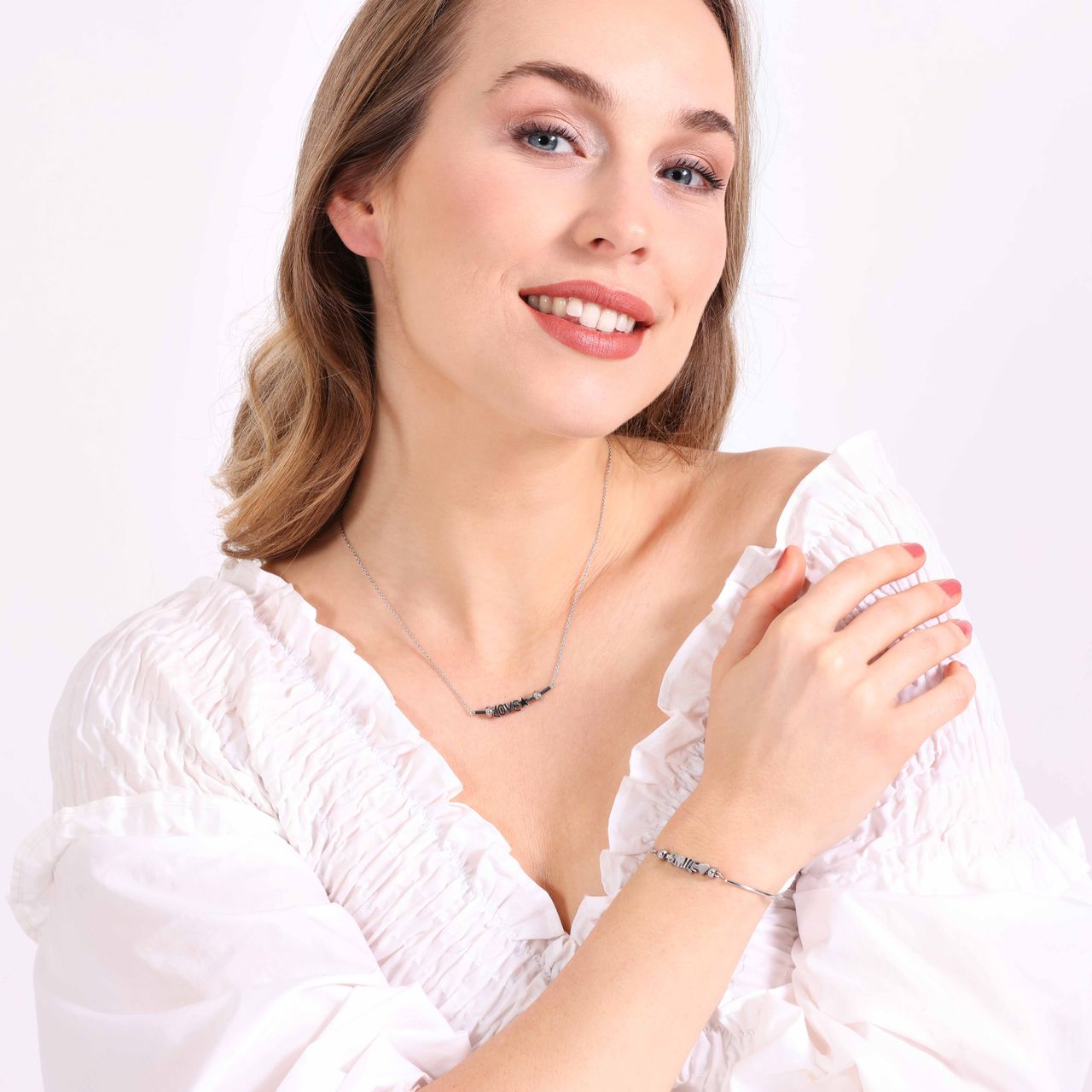 Gerecycled stainless steel charm letter