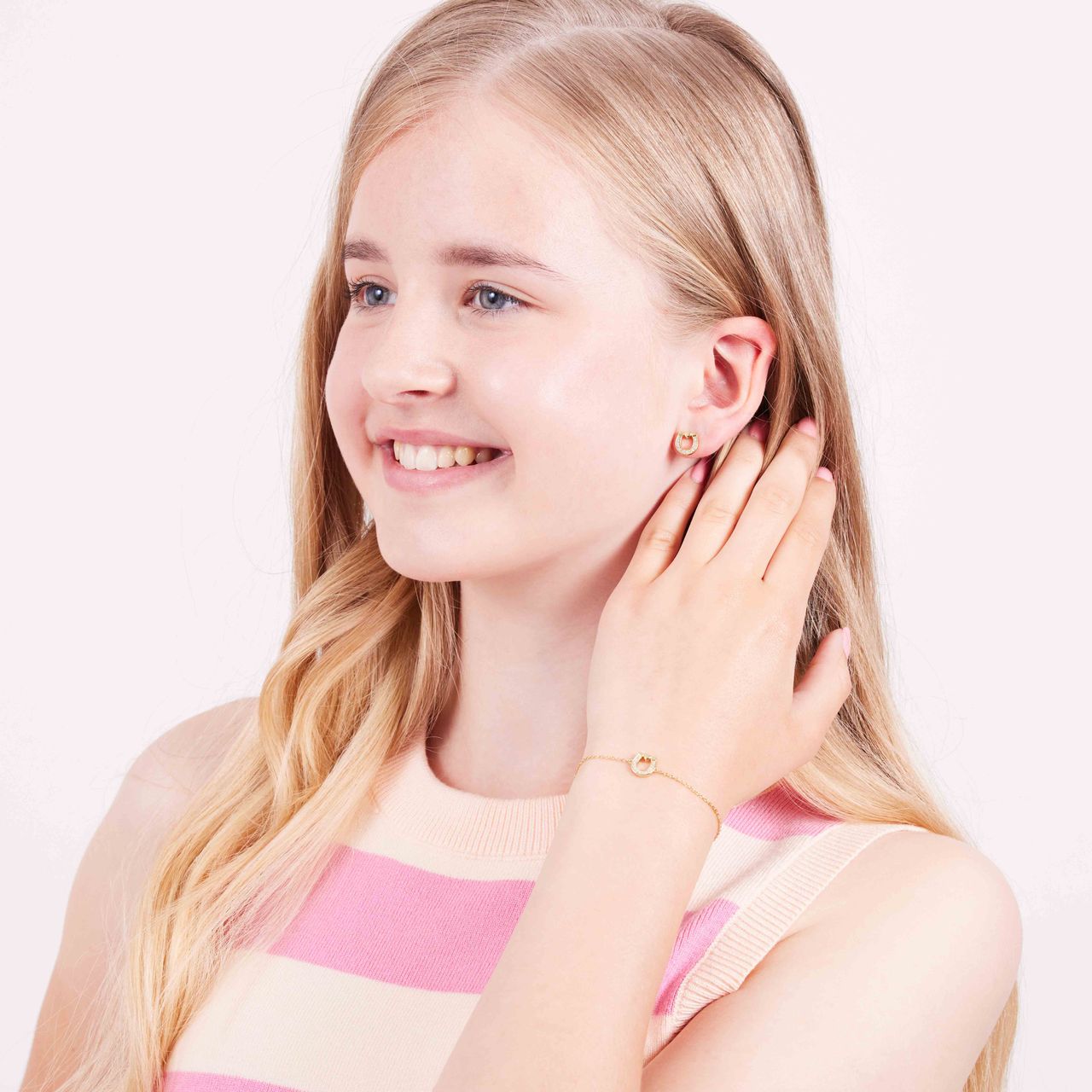 Zilveren goldplated kinderarmband met hoefijzer en zirkonia