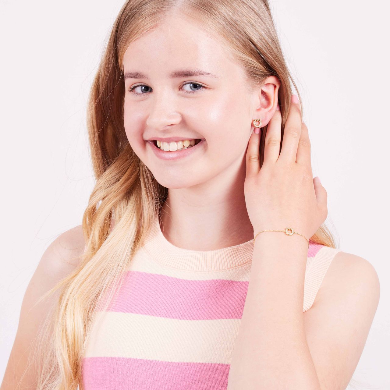 Zilveren goldplated kinderoorknoppen hoefijzer met zirkonia