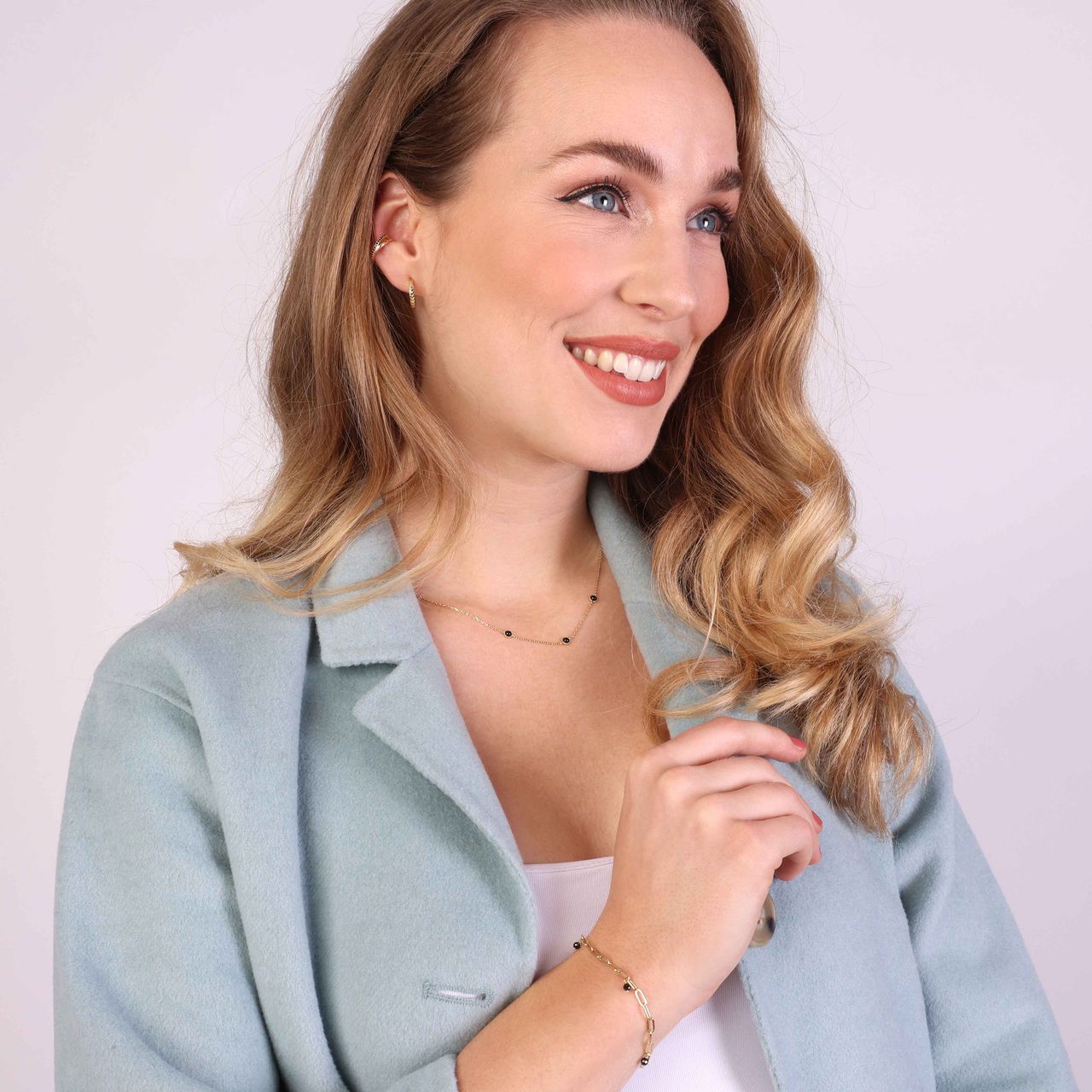 Zilveren goldplated armband bedels zirkonia zwart