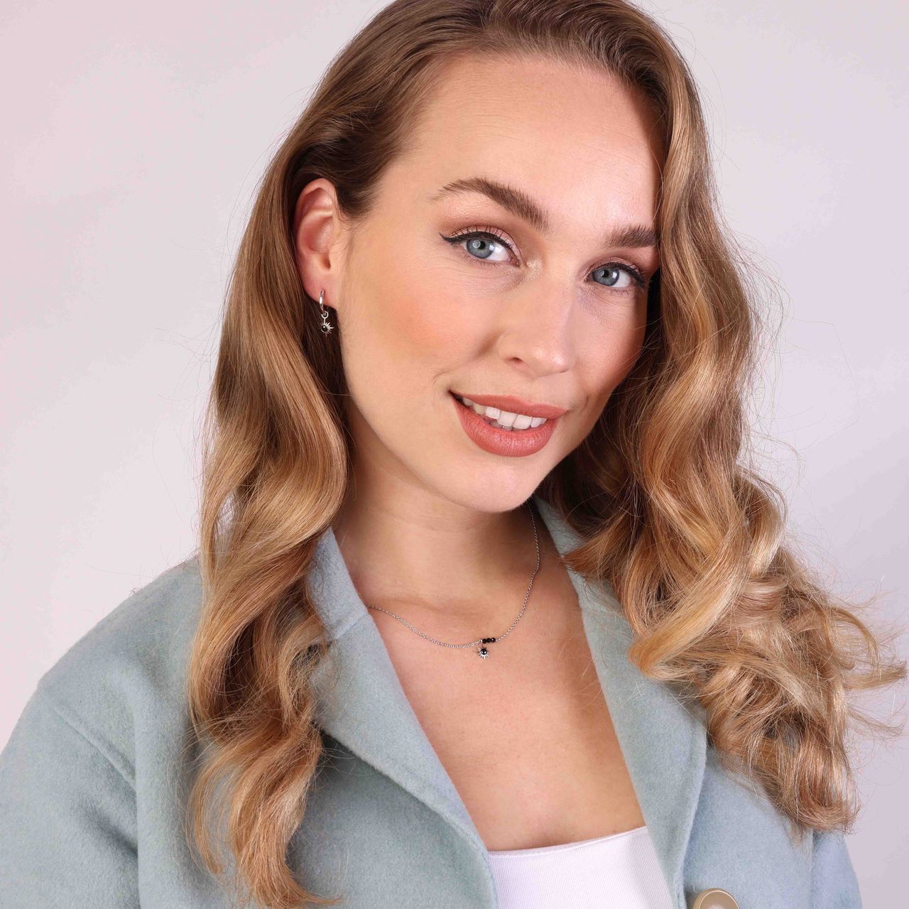 Zilveren ketting met hanger zon zirkonia zwart