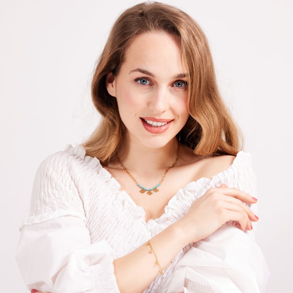 Stalen goldplated armband met hanger oogjes