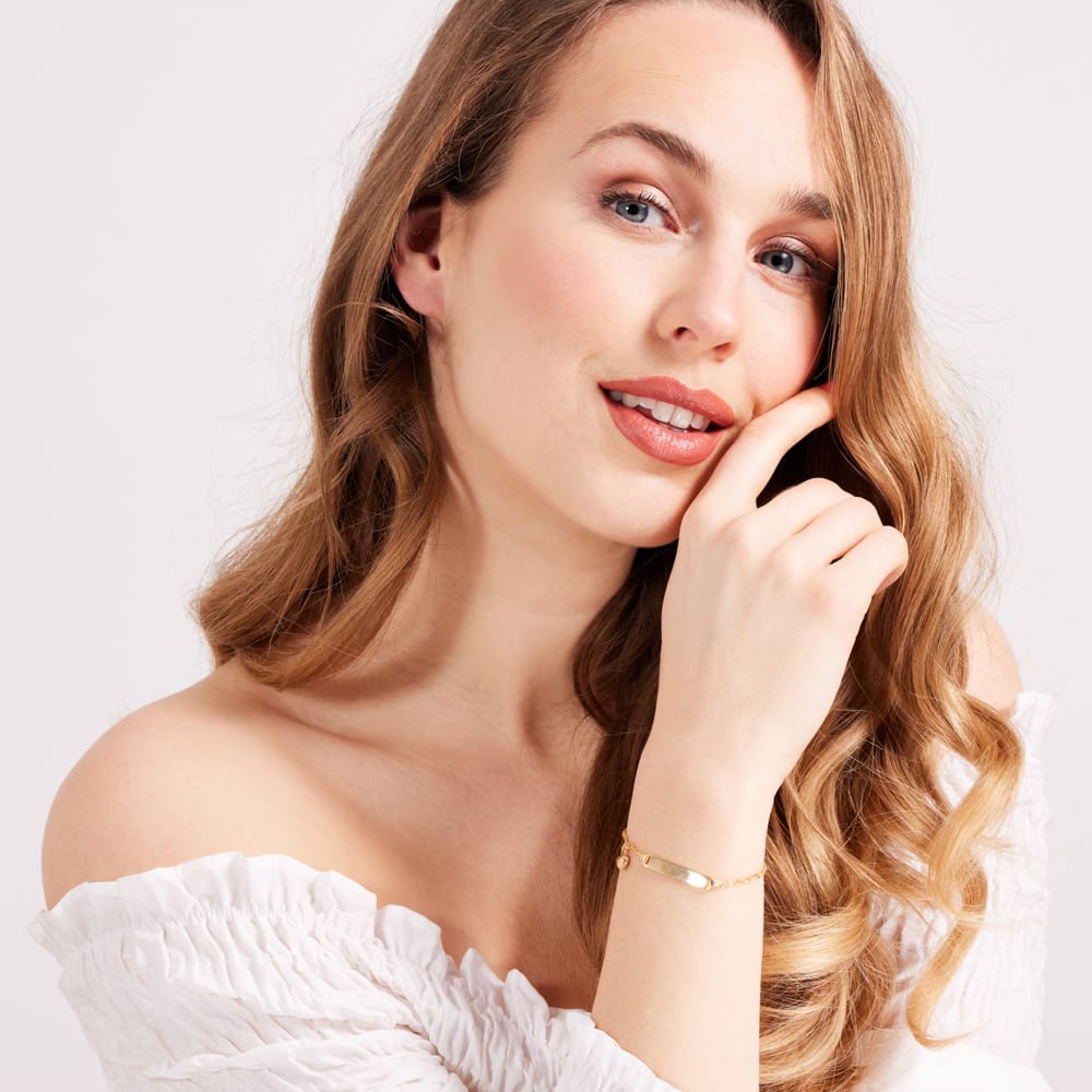 Zilveren goldplated plaatarmband met hart