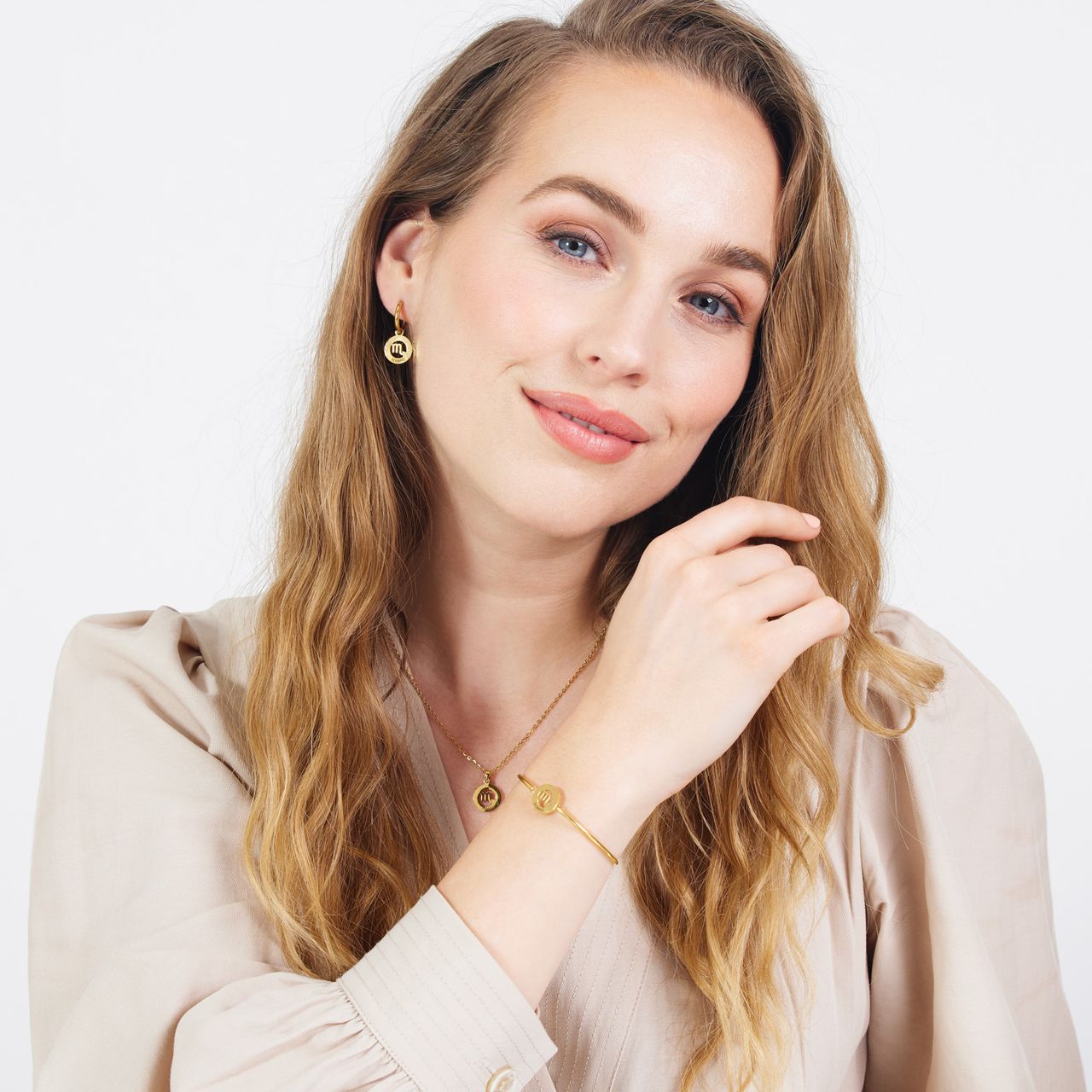 Stalen goldplated armband met sterrenbeeld schorpioen