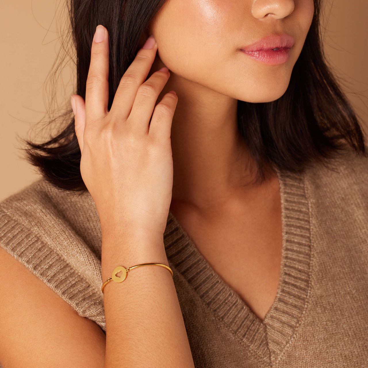 Stalen goldplated armband met open hart