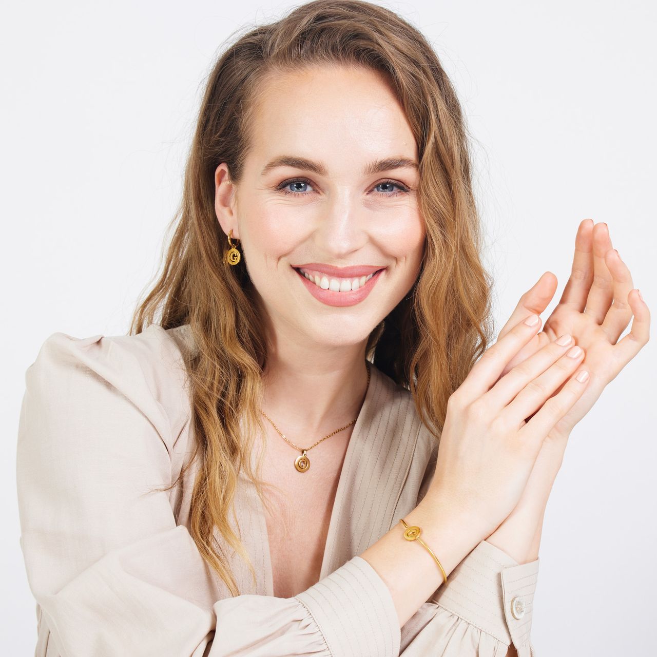 Stainless steel goldplated fantasiearmband met letterhanger G voor dames