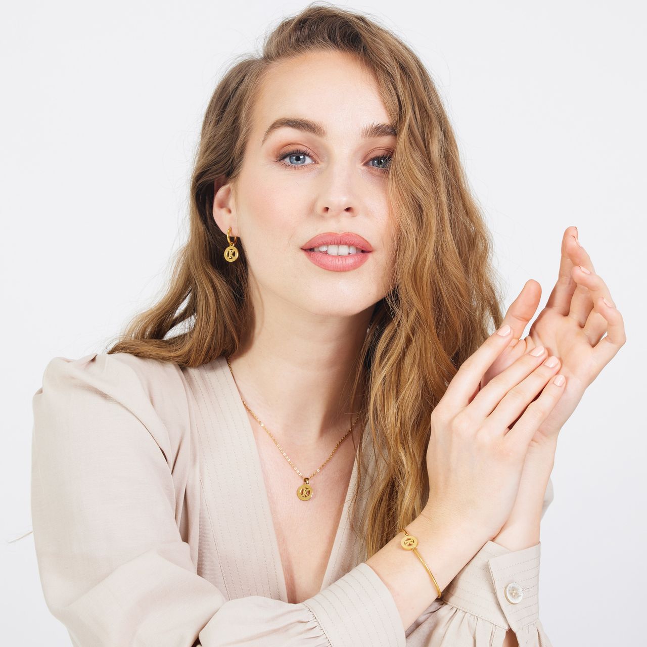 Stalen goldplated armband met letter - K