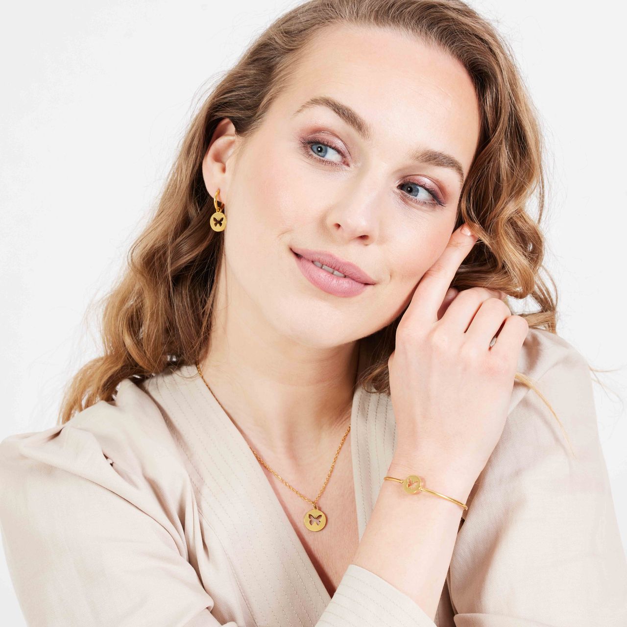 Stalen goldplated armband met vlinder