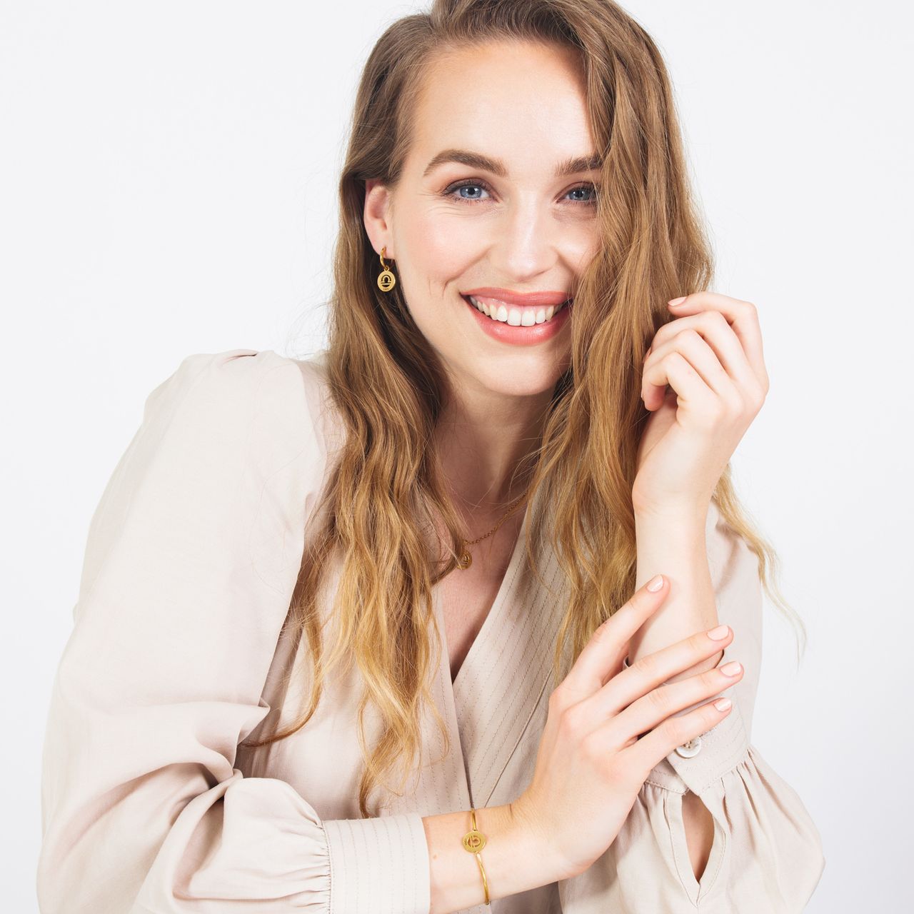 Stainless steel goldplated ketting met sterrenbeeld weegschaal