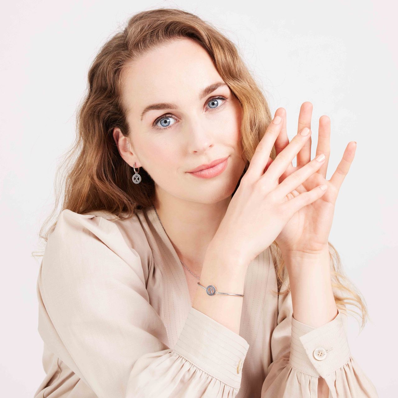 Stainless steel oorbellen met letter - X