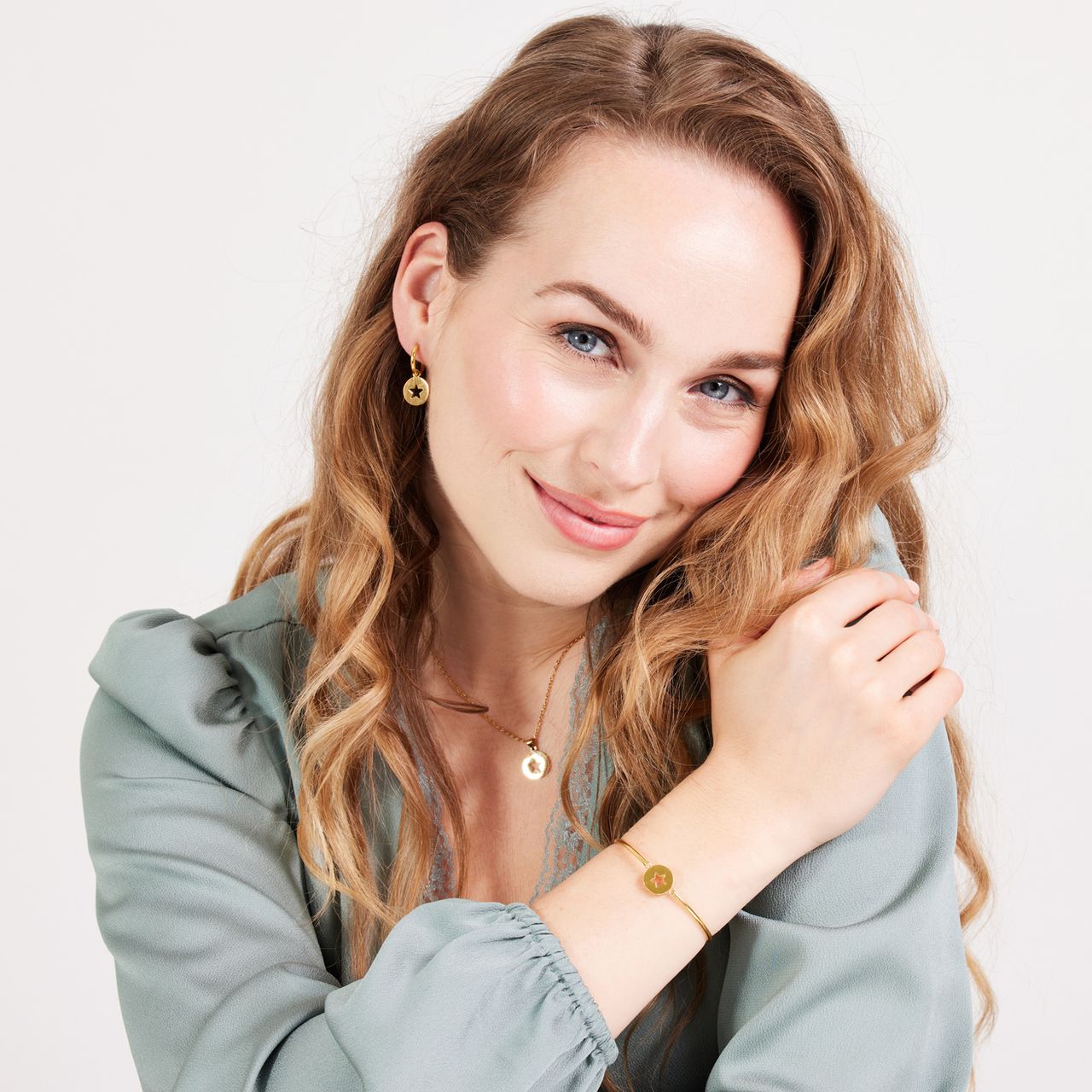 Stainless steel goldplated oorringen met hanger open ster voor dames