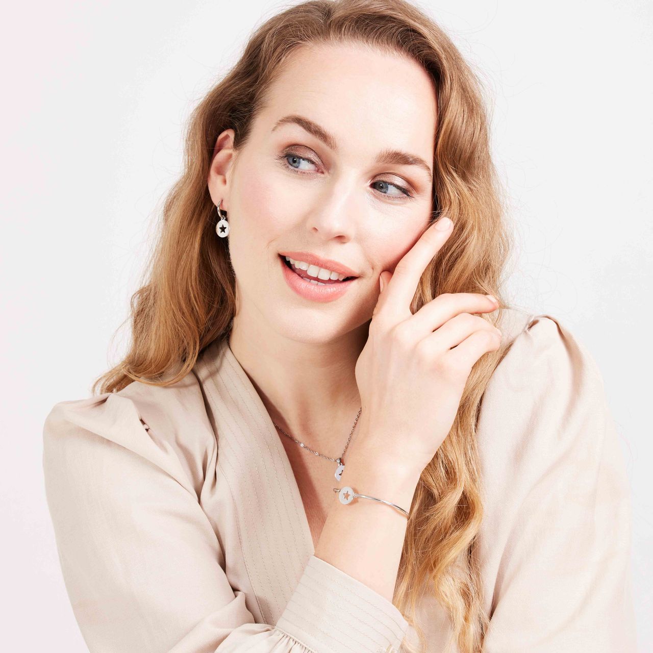 Stainless steel oorbellen met open ster